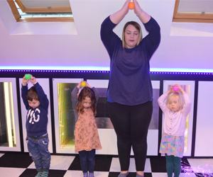Old schoolhouse nursery doing yoga