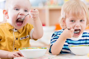 children eating their snack or lunch food