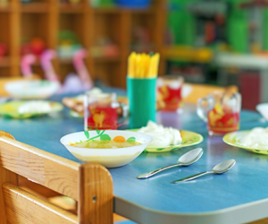 Empty lunch table with food