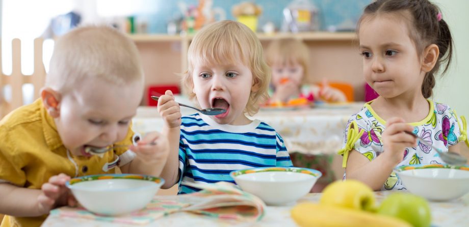 Vitamin angels: children eating food at nursery