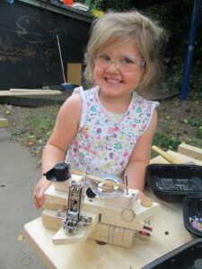 Child doing woodwork, Pete Moorhouse