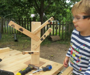 Child doing woodwork, Pete Moorhouse