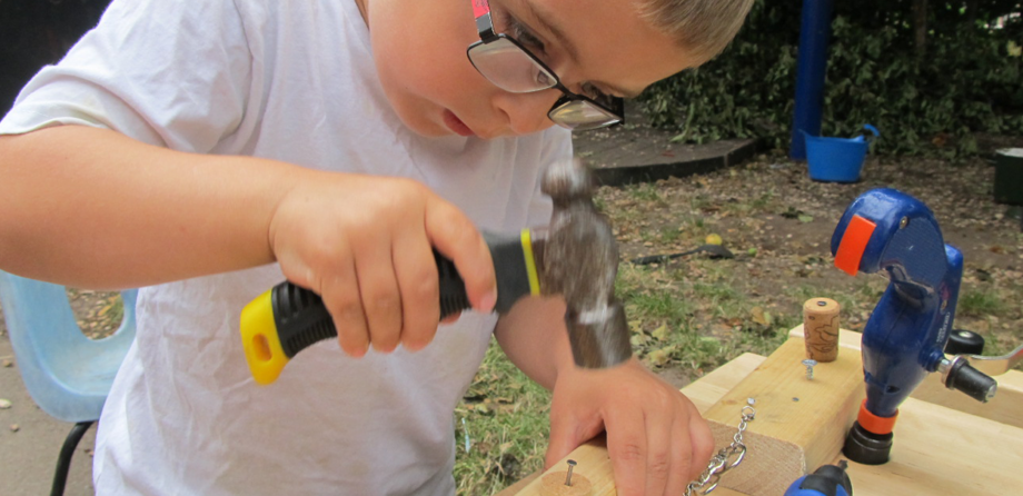 Child doing woodwork, pete moorhouse