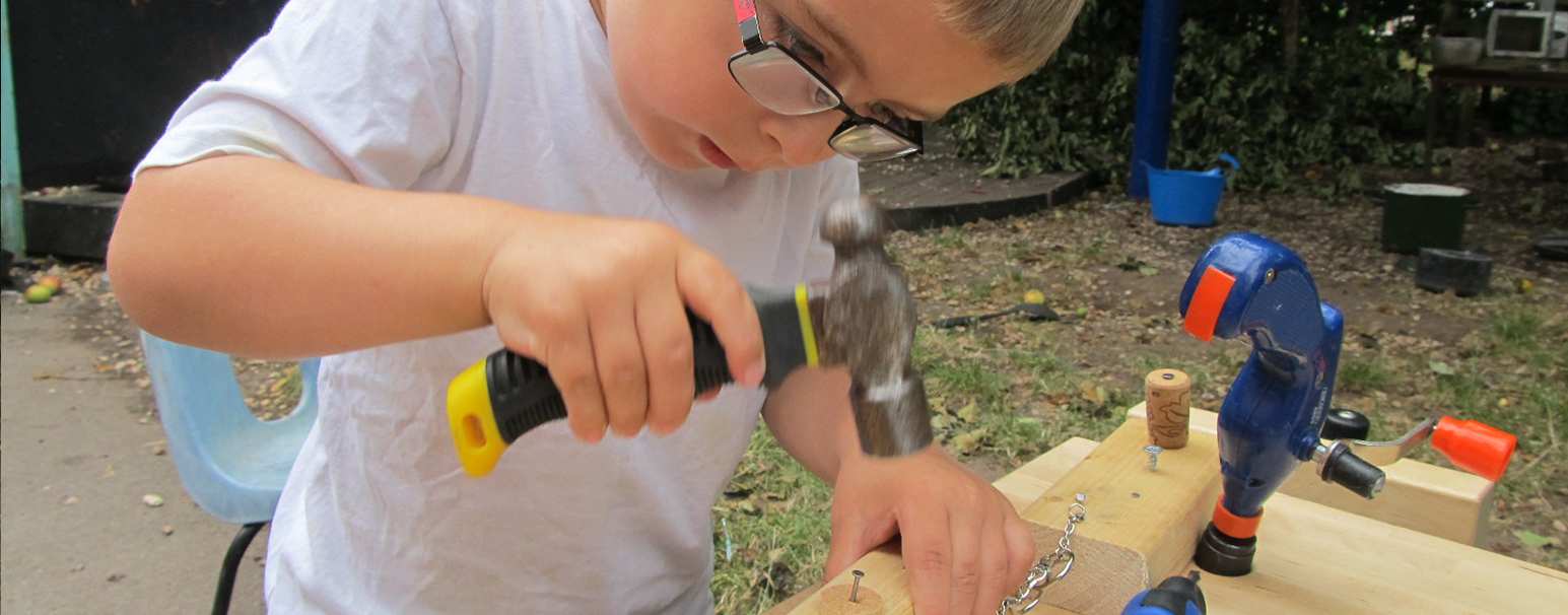 Child doing woodwork, pete moorhouse