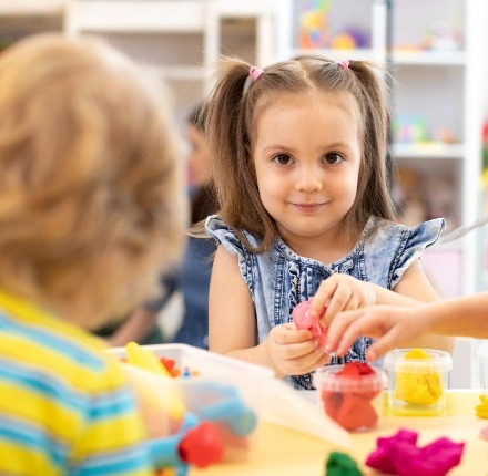 Smiling girl at nursery