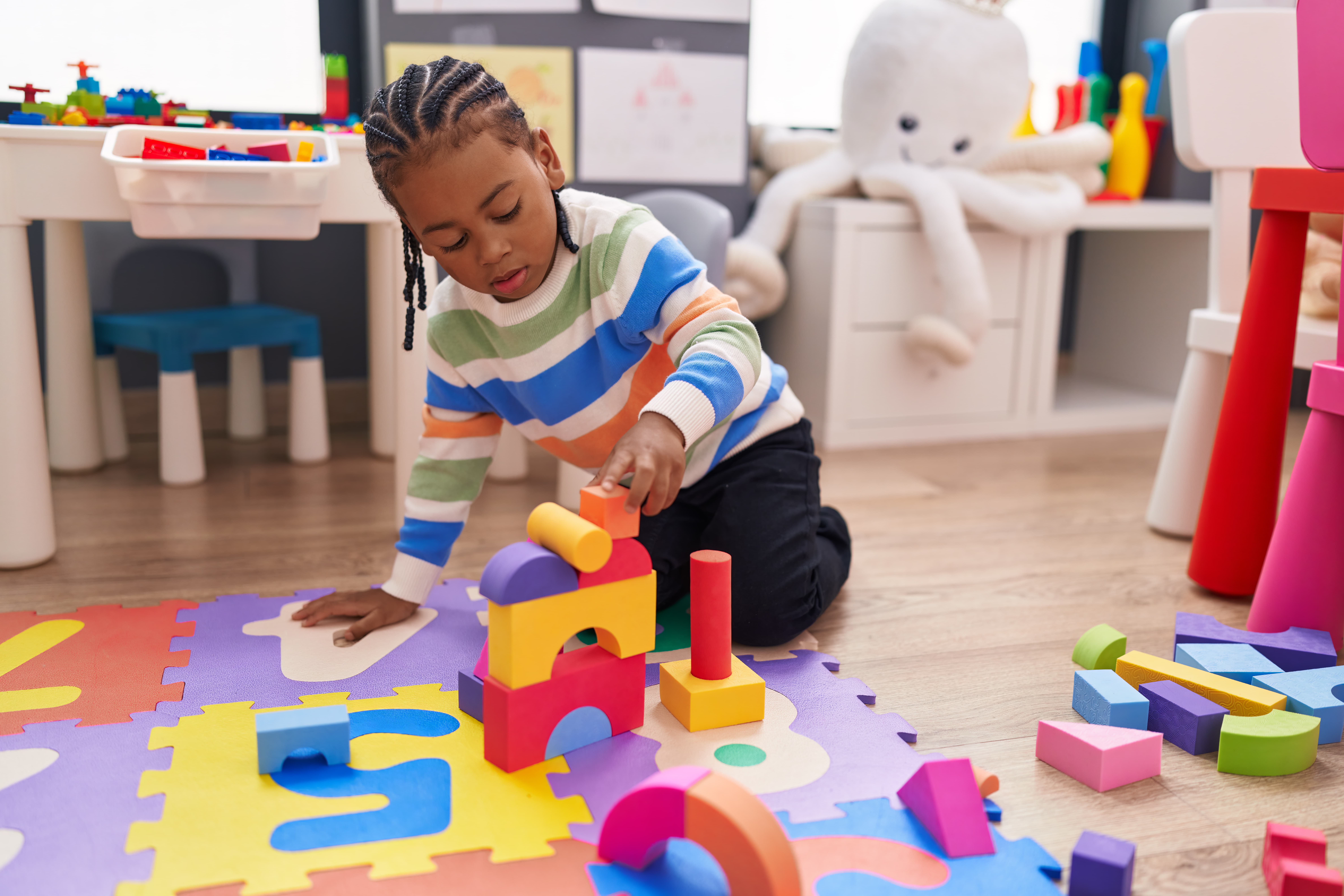 Child building blocks at nursery