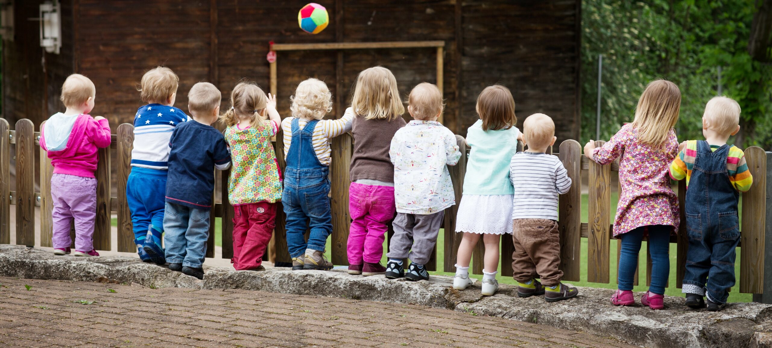 line of nursery children outside