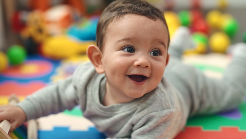 Smiling baby at nursery