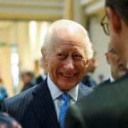 King Charles smiling