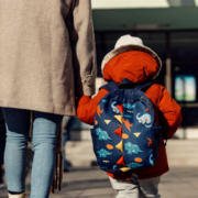 child and parent walking to nursery