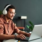 Nursery practitioner on laptop