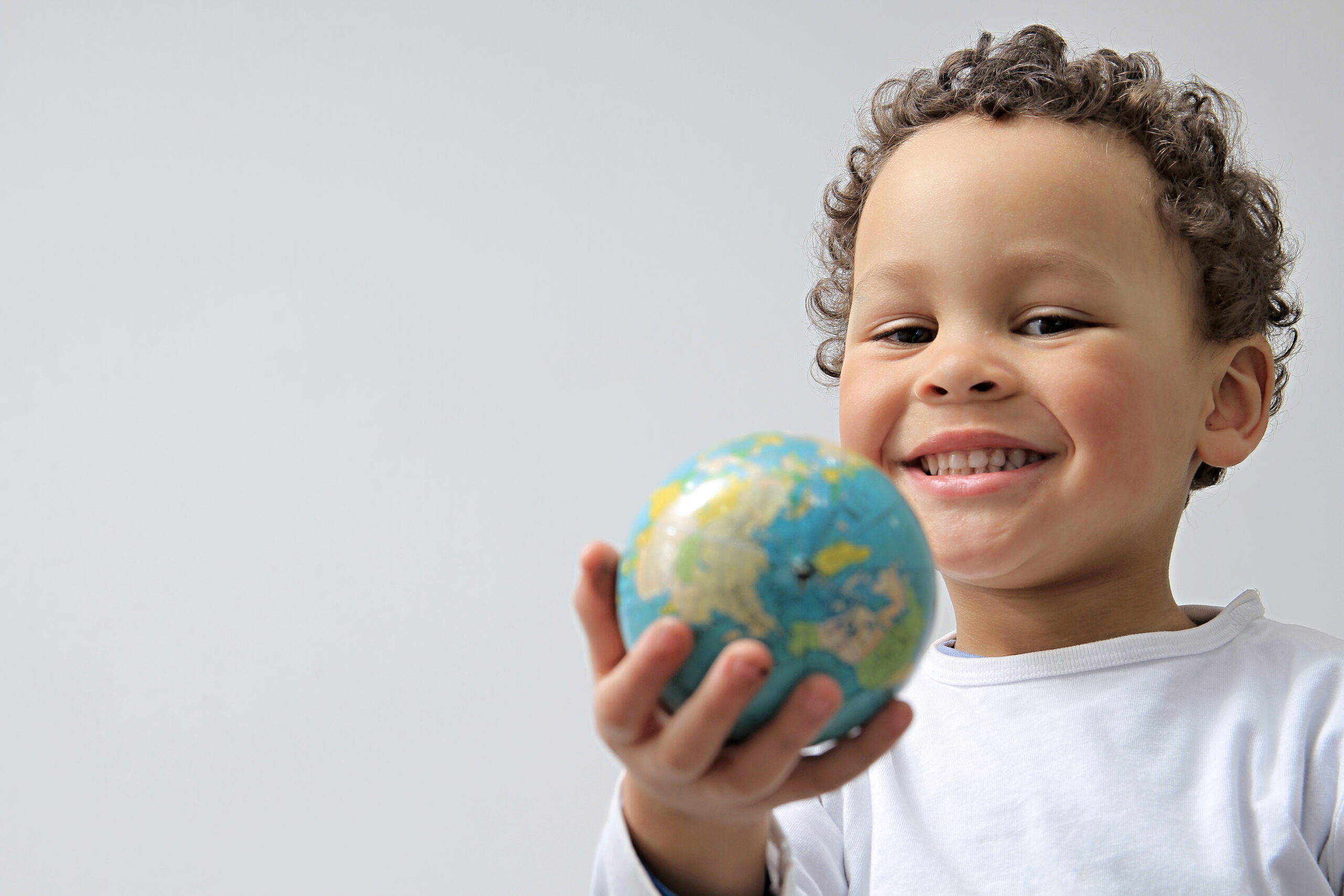 Cultural Capital in early years child with globe