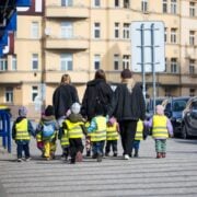 children walking across road
